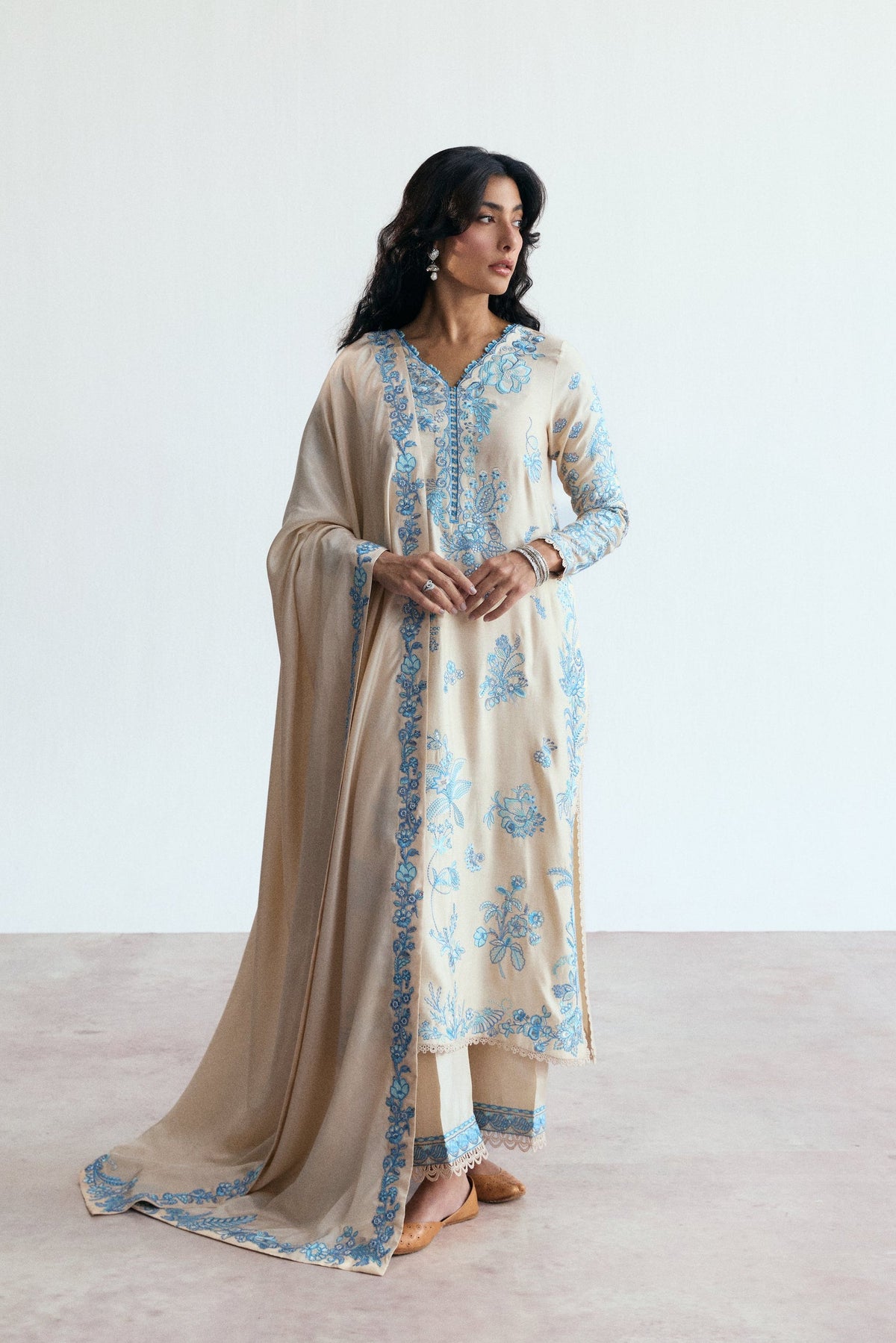 Opalite Set by Mannam featuring a cream rayon shirt with blue floral embroidery and silk dupatta.