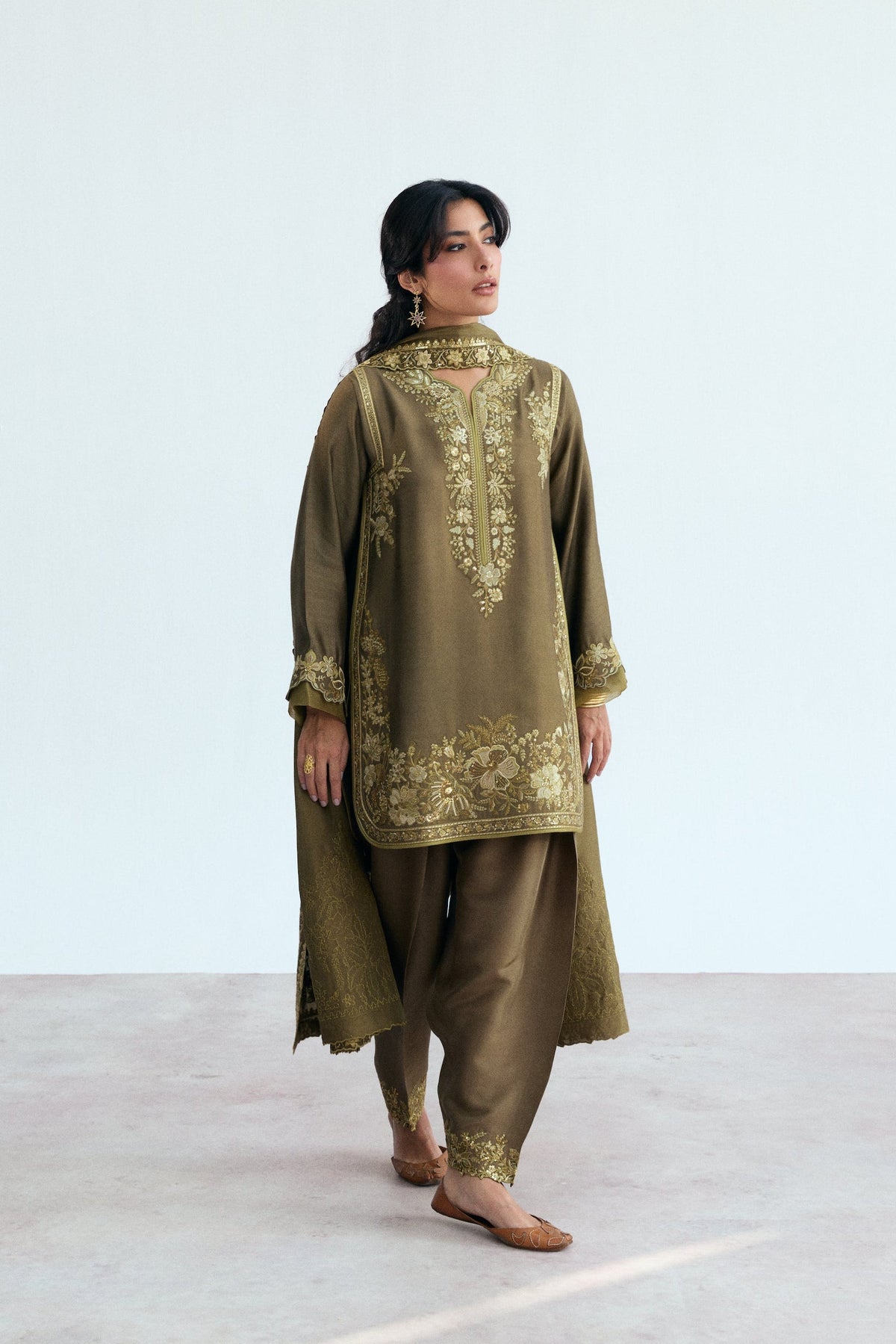 Short rayon kameez in mehndi green with scalloped neckline and embellished sleeves, elegant Pakistani festive suit