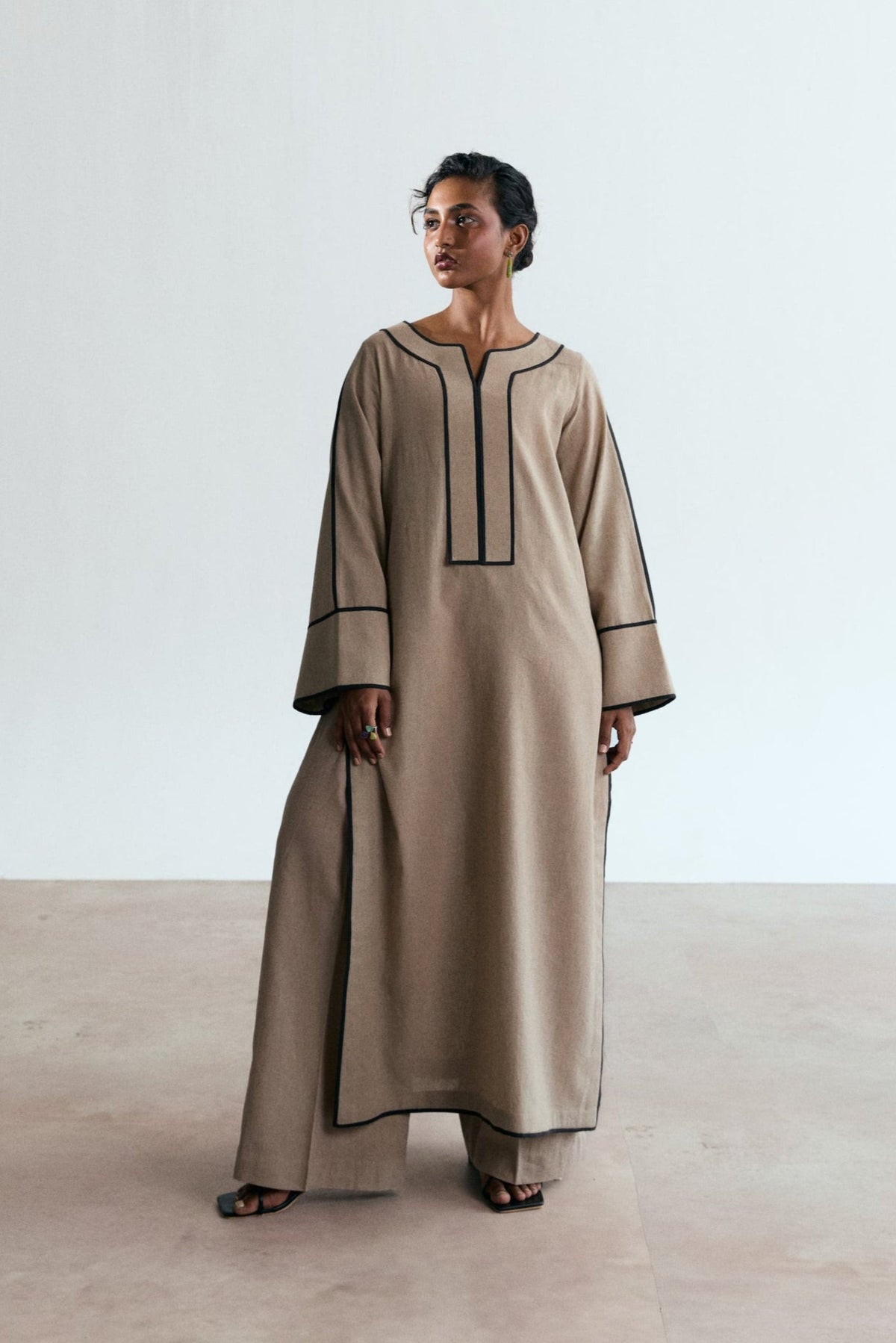 Mannam Stone Set — sand beige bell-sleeve linen-cotton Pakistani co-ord with black piping | casual South Asian wear UK