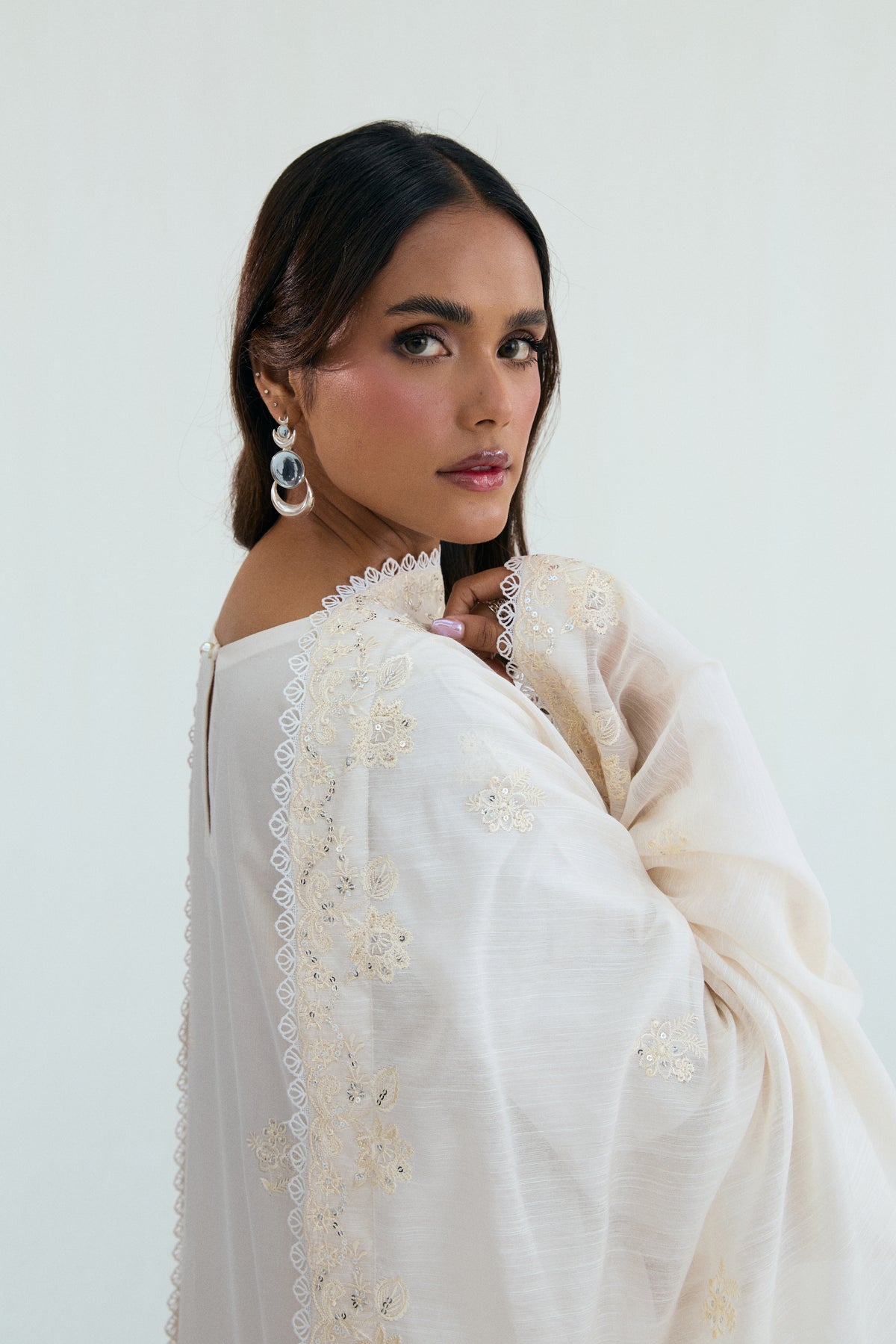Moonstone ivory Pakistani outfit featuring shiffli embroidery and wide-hem sleeves — Mannam formal cotton kameez UK