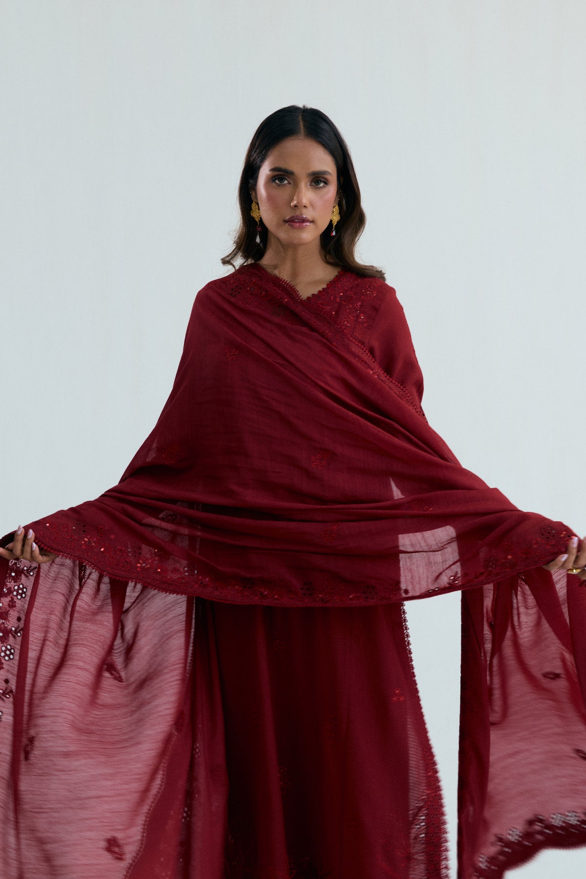 view of maroon embroidered women dress