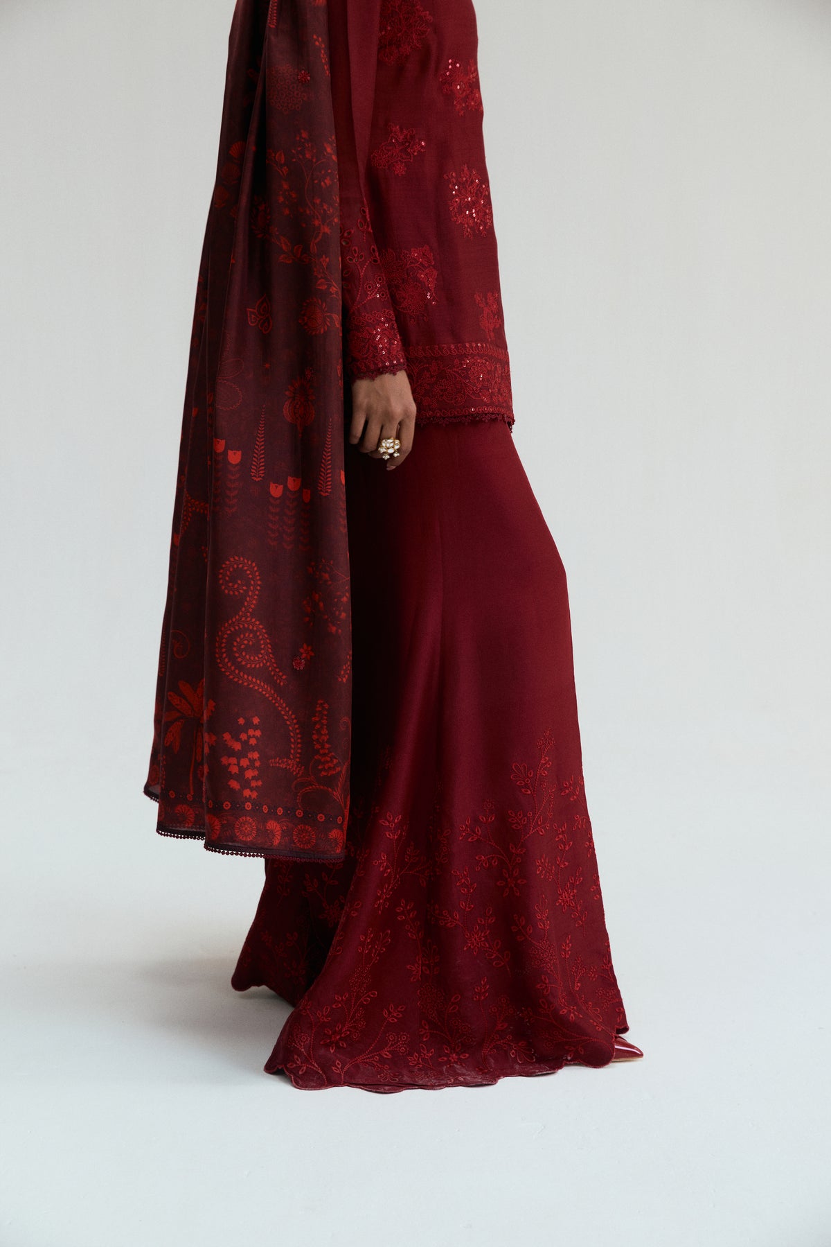 Deep red raw silk Pakistani angrakha kameez with embroidered wide-flare trousers — South Asian festive wear UK