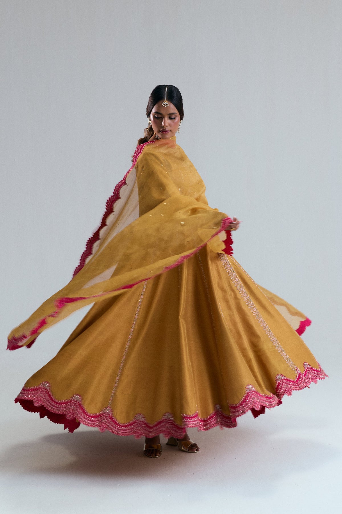Pakistani formal wear Kalidaar Angrakha mustard yellow frock crafted in luxurious silk and organza