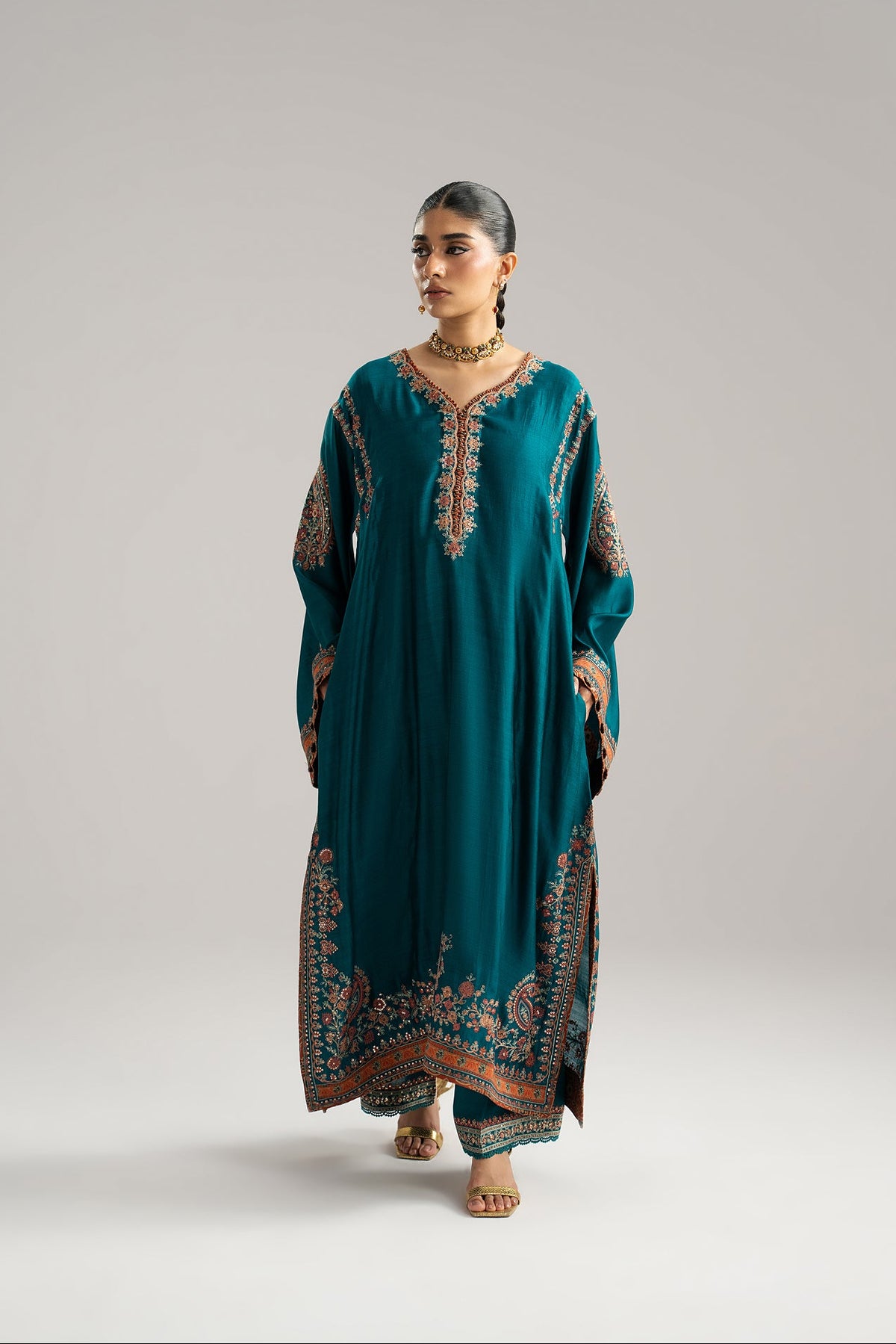 Afroz Set showing pocket detail on teal pure silk Pakistani phiran