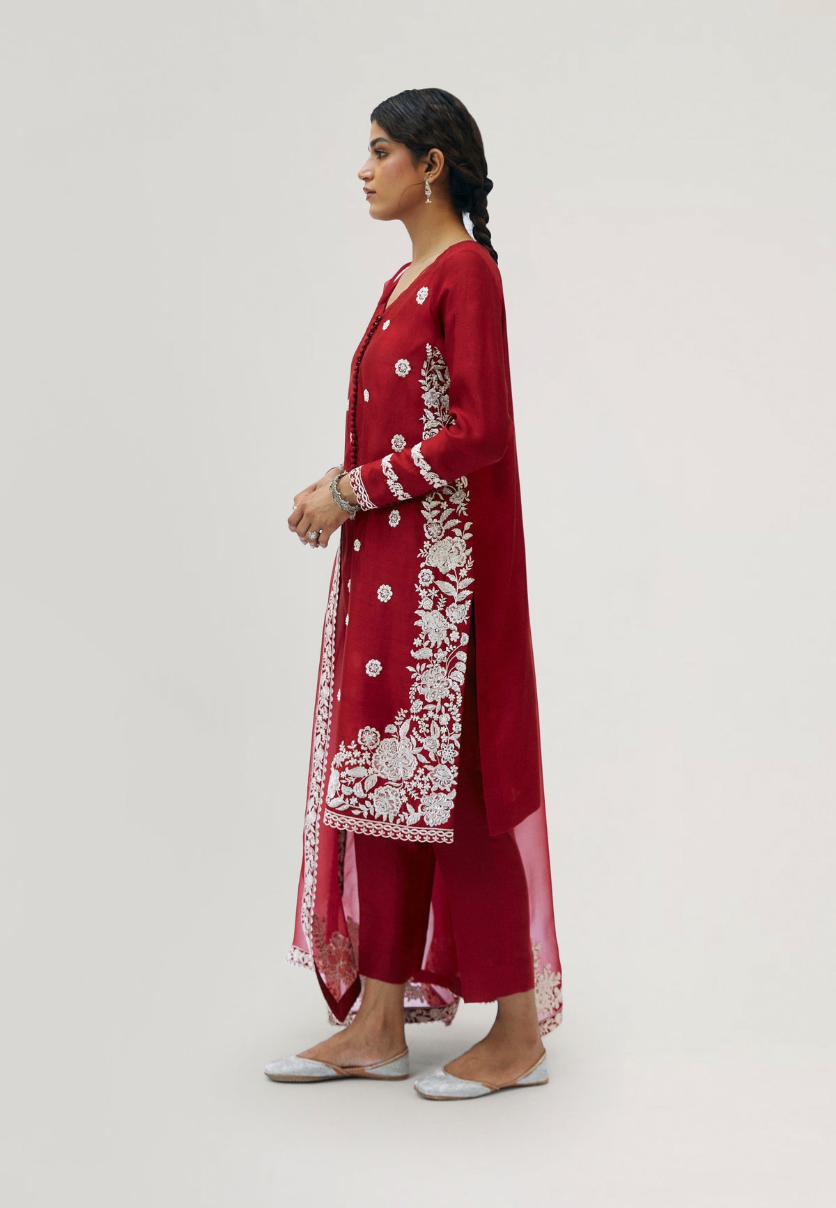 Premium crimson silk Pakistani three-piece suit with scalloped hem and organza dupatta — wedding and festive wear UK