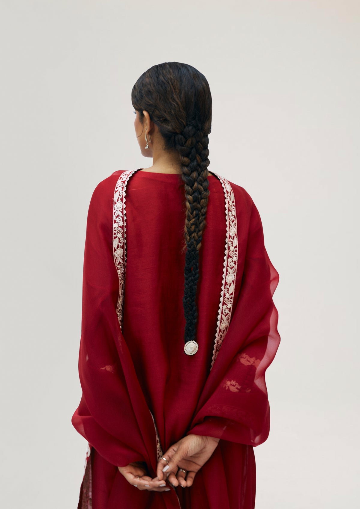 Crimson pure silk Pakistani suit with embroidered organza dupatta and tapered trousers — designer formal dress UK