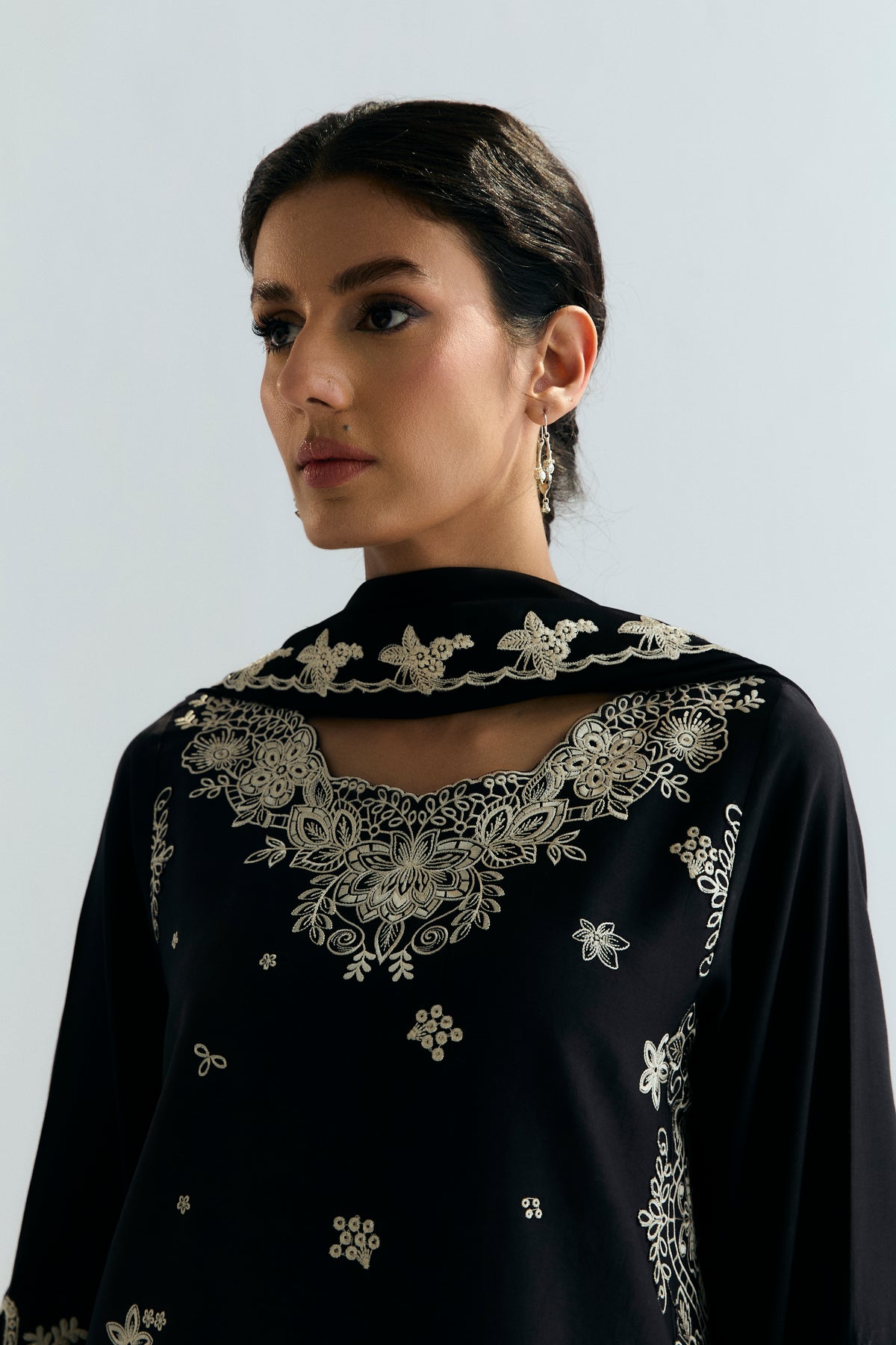 Women wearing Mannam Coal Farshi Set — black Pima cotton kameez with farshi shalwar for Pakistani weddings and festive occasions