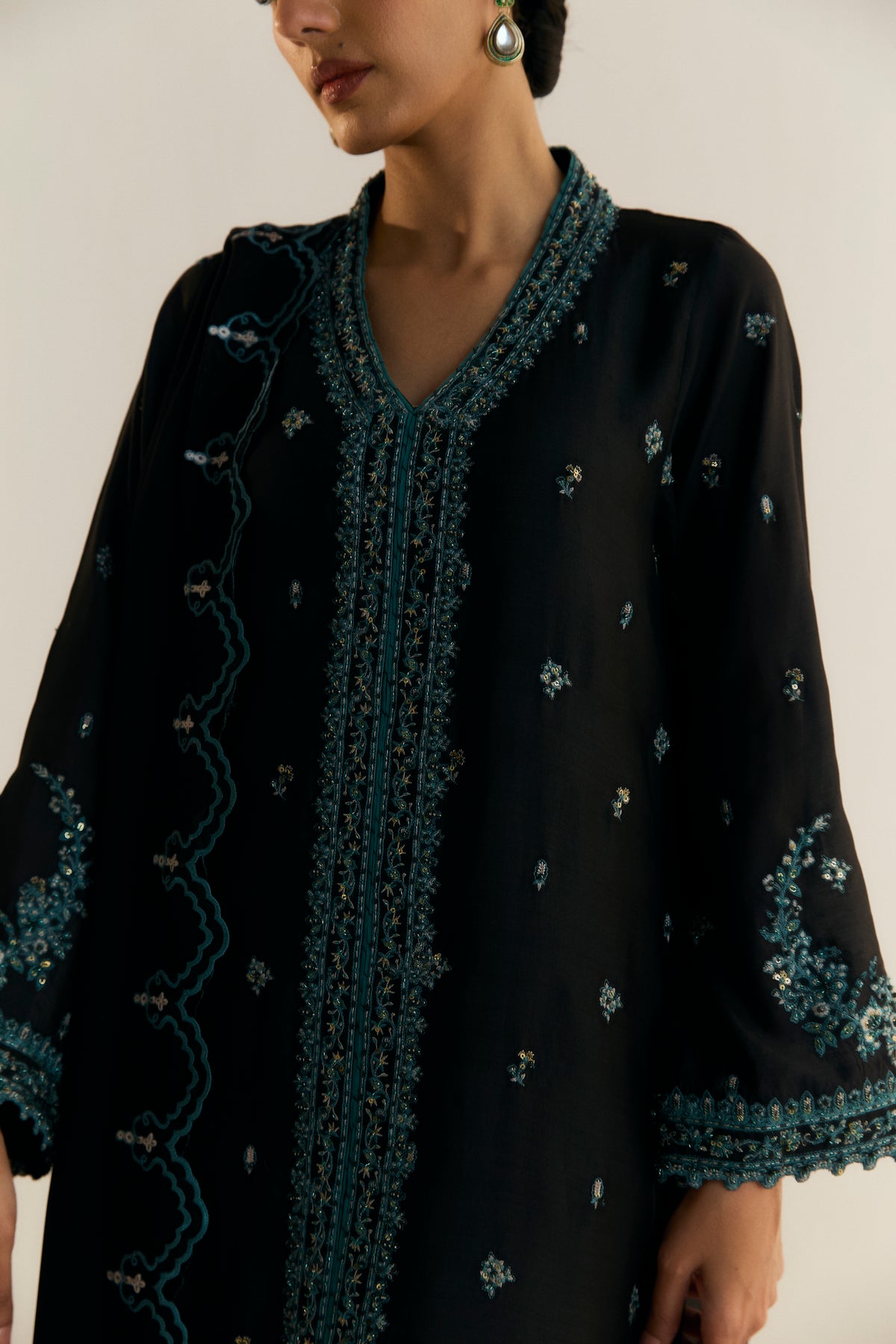 Elegant black khaadi silk Pakistani jacket-style kameez with petal-edge georgette dupatta — formal occasion wear