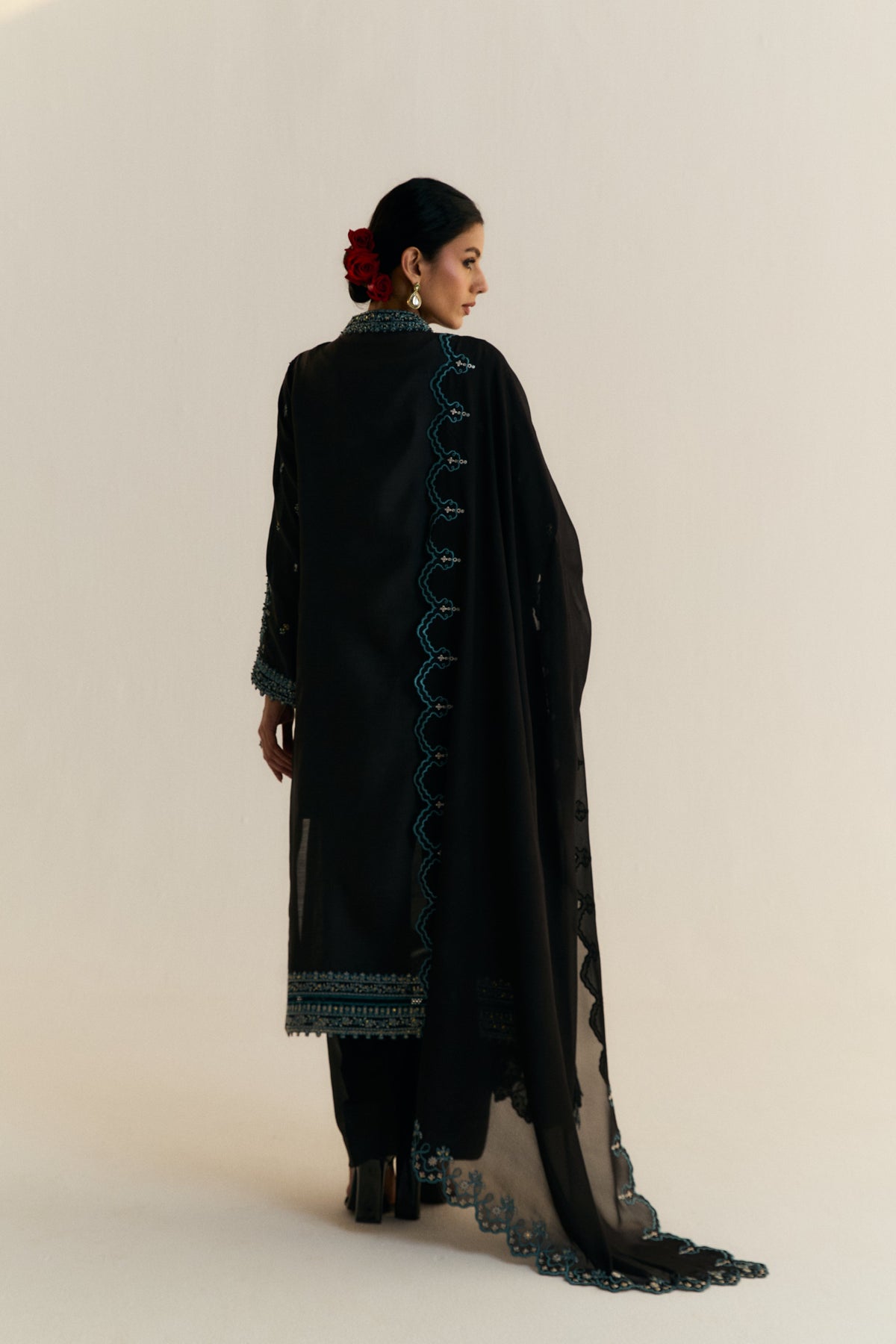 High-end black khaadi silk Pakistani formal outfit with Adda embroidery and embroidered georgette dupatta by Mannam