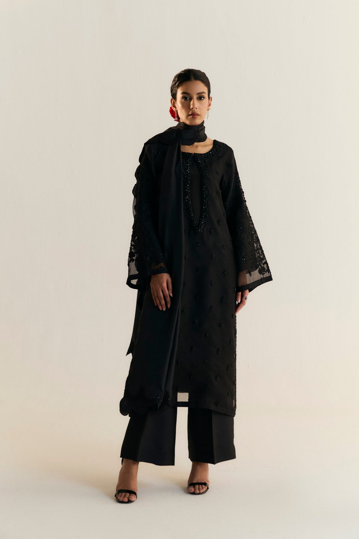 Mannam Raven Set — all-black organza kameez with floral beadwork and hand-embroidered silk dupatta, Pakistani luxury formal wear