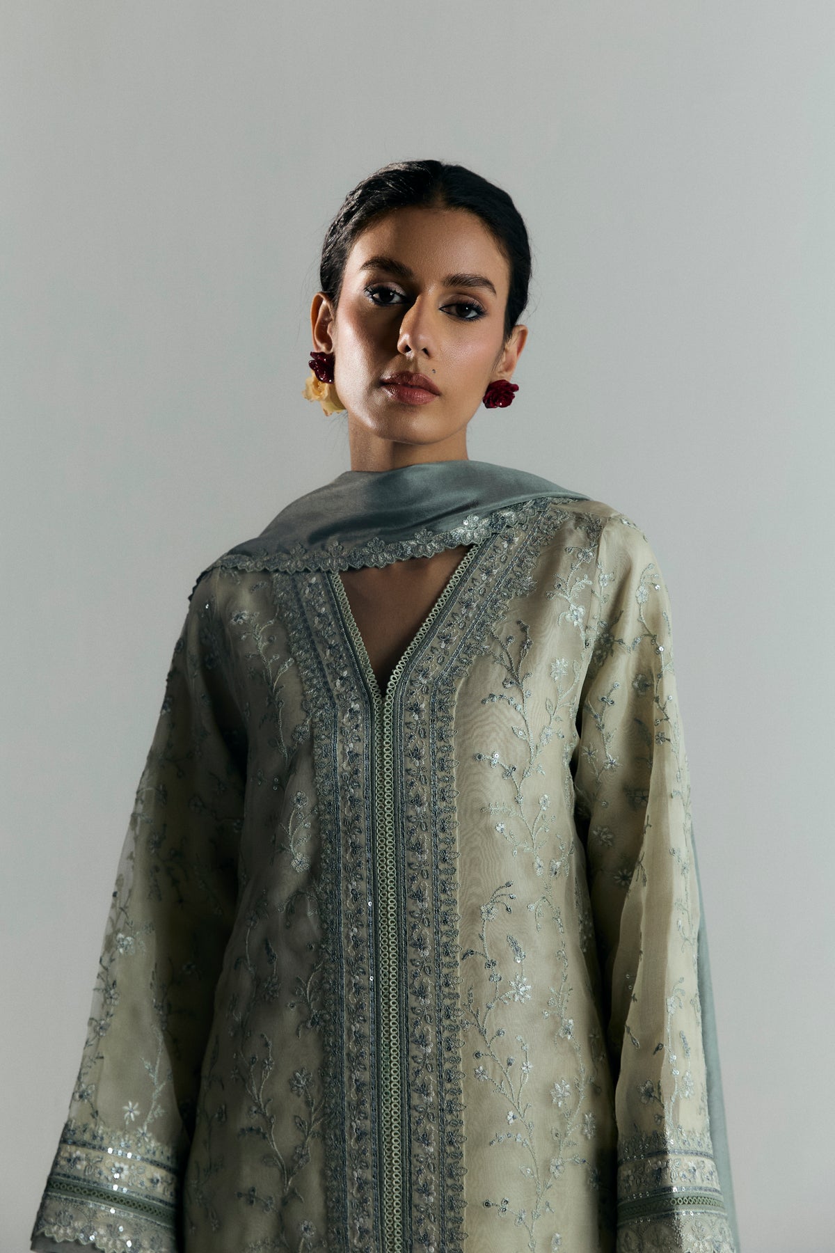 Frost Set layered effect — grey tones visible through organza sleeves and hem