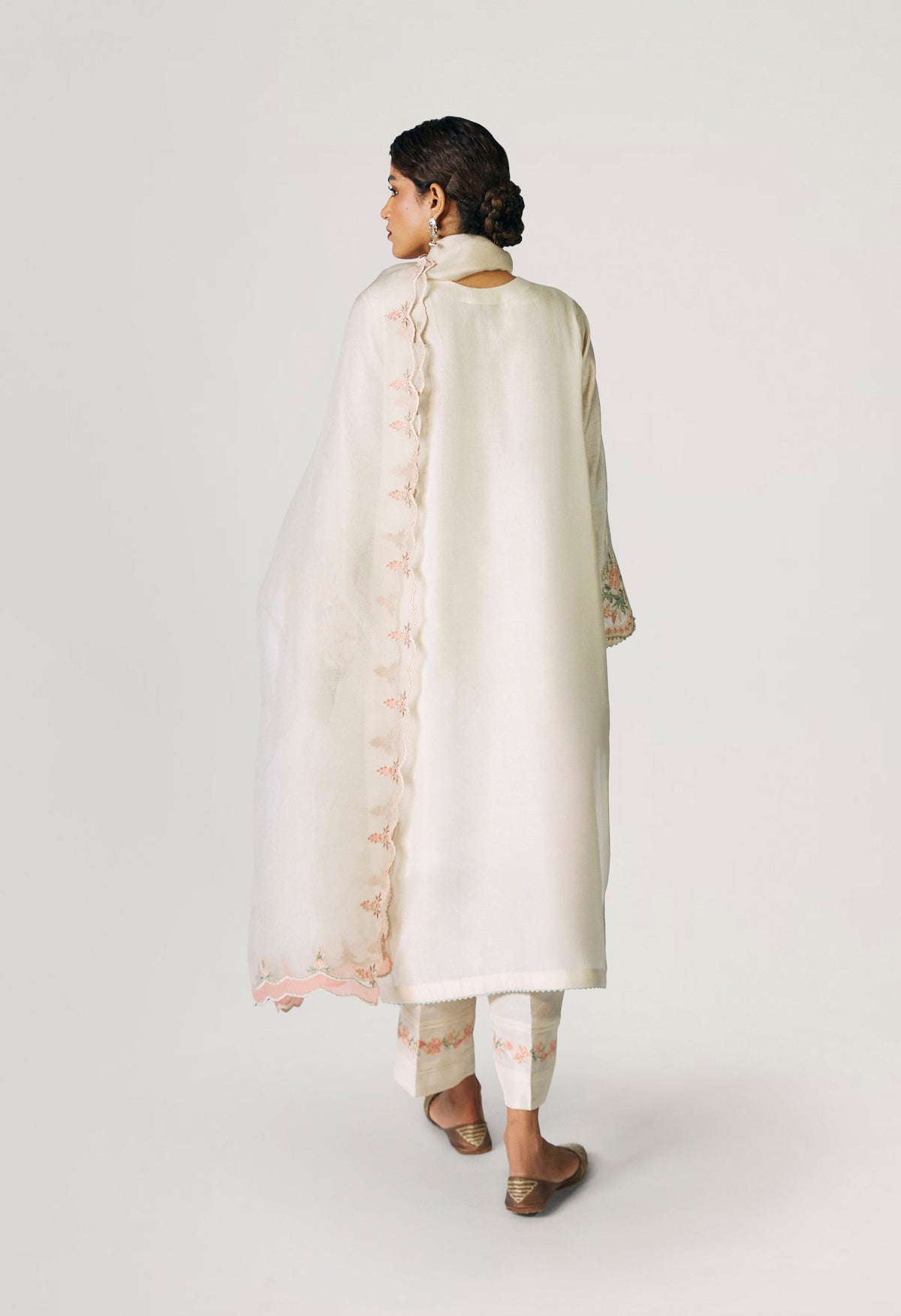 Women wearing Mannam cream embroidered silk kameez set with organza dupatta — Pakistani formal suit for Eid and weddings