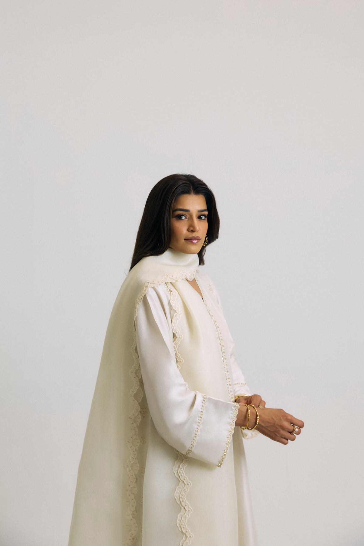 Hand-embellished raw silk Pearl kameez with mirror work side panels and gota embroidery along neckline — traditional Pakistani formal wear for women