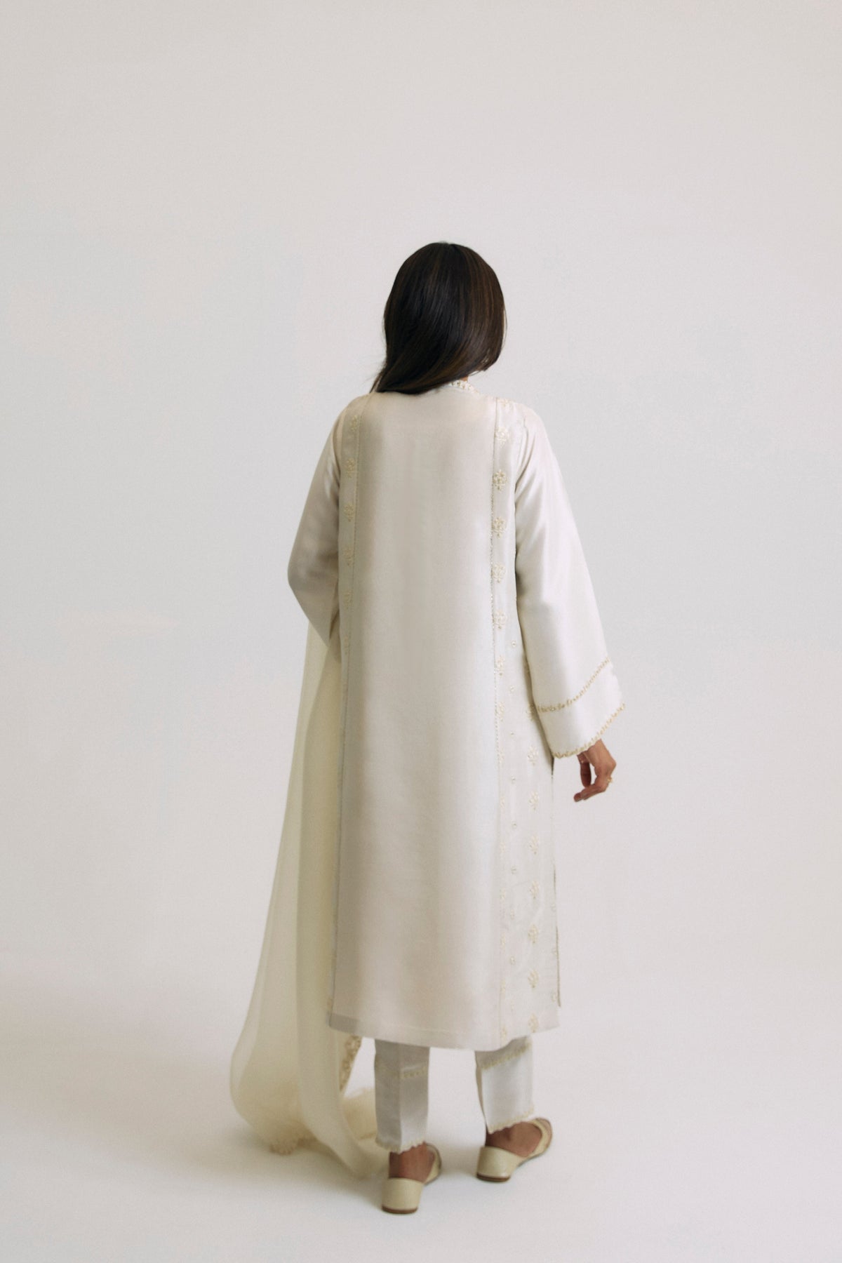 Designer raw silk three-panel Pearl kameez set with tapered embroidered trousers matching sleeve detailing — South Asian formal occasion outfit UK