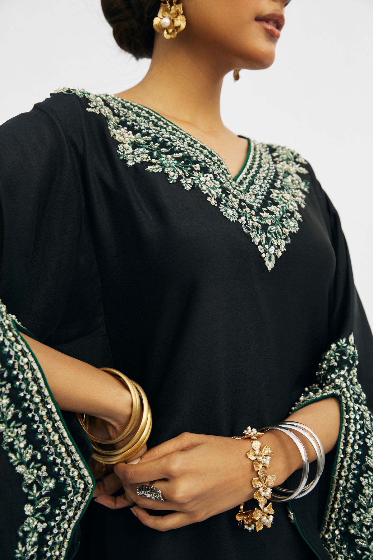 Elegant black raw silk traditional Pakistani phiran suit — premium festive wear with functional pockets