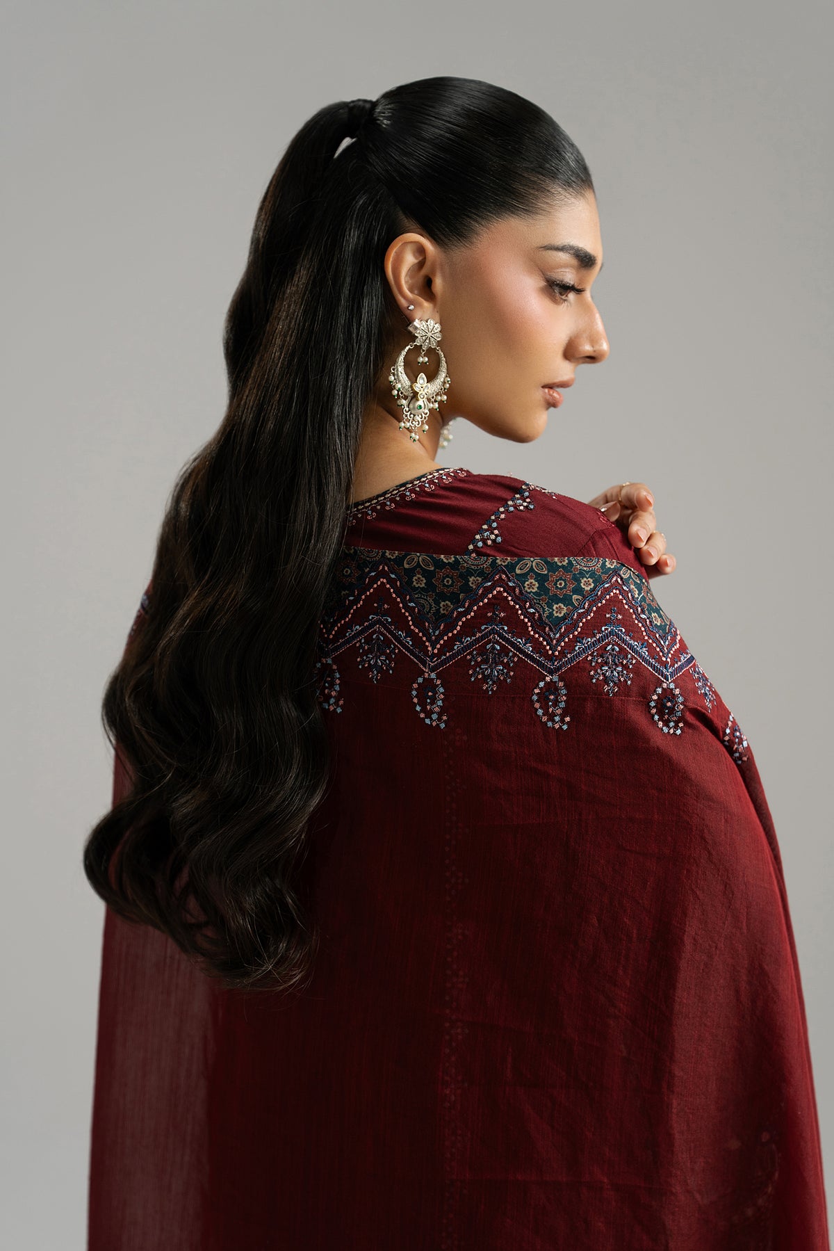 Mannam Saffron Set styled — maroon tassels and Sindhi sequin embroidery | Eid collection UK