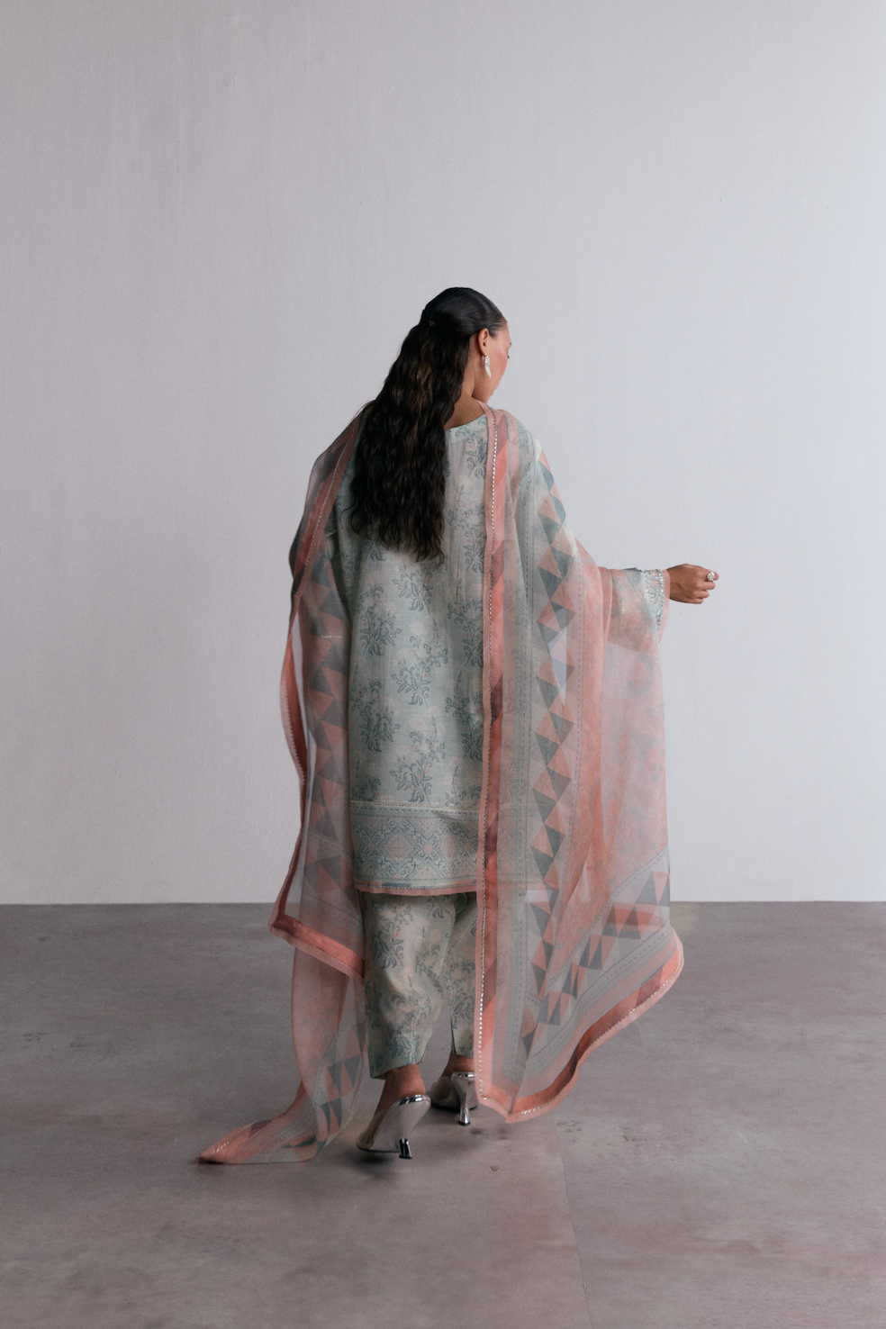 Sky Blue short kameez hem detail — hand embellishments and floral print