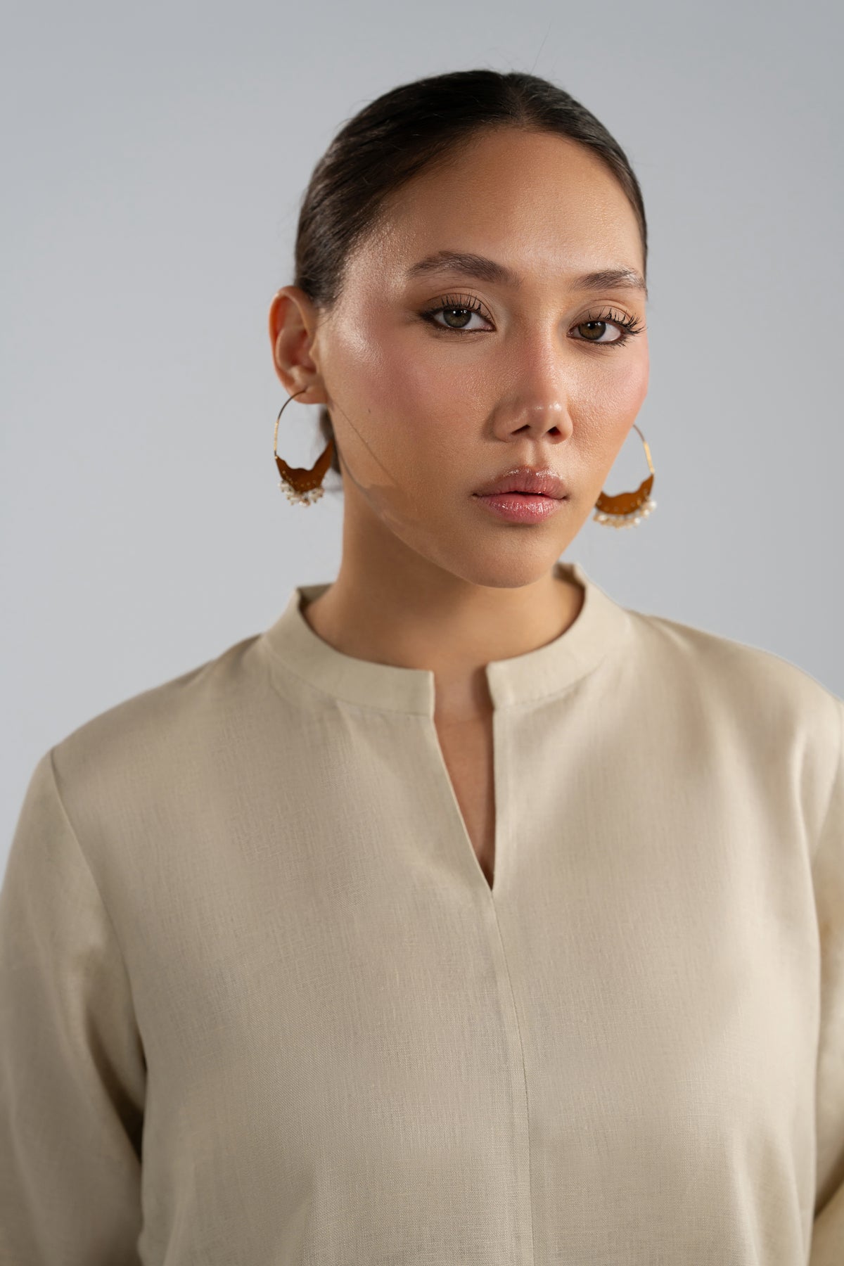 Close-up portrait in Birch Set kameez, natural beige tone