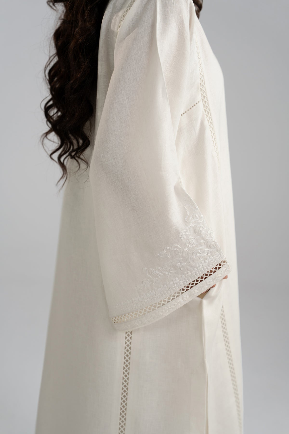Lace hem insert detail on cuffs and sleeves
