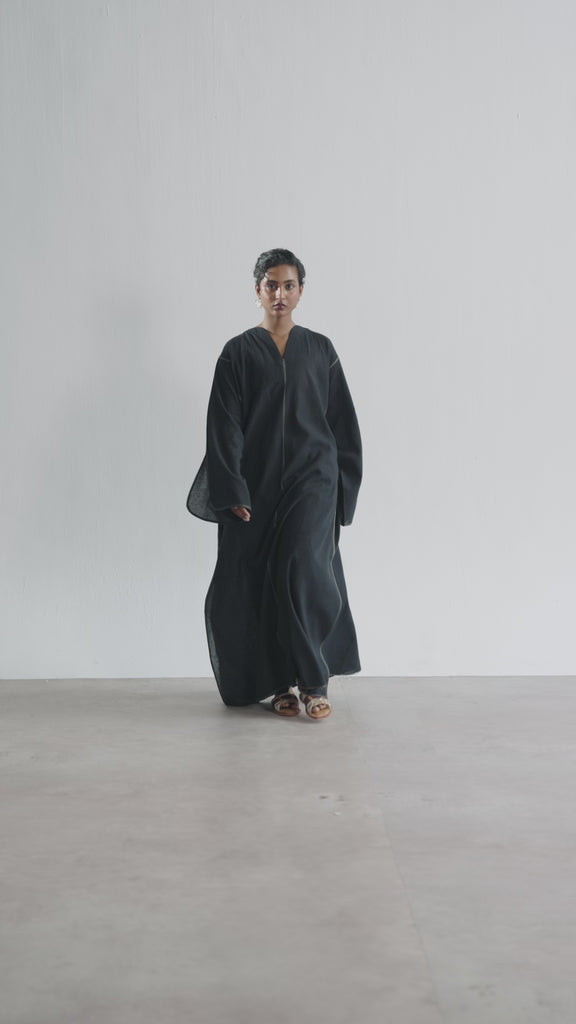 Video of Mannam Ebony Kaftan Set — black linen-cotton Pakistani kaftan with wide sleeves and straight trousers