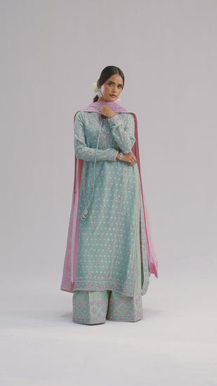 The Azure Set is an ice mint Pakistani kameez in jacquard khadi net with multicolour resham embroidery, hand-placed crystals, and beadwork, available to pre-order with free UK delivery from Mannam.