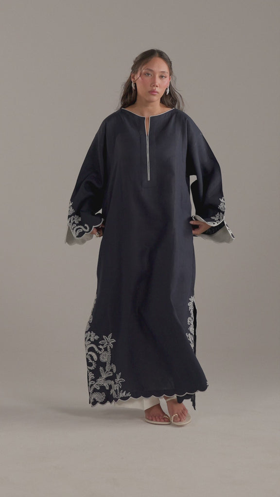 Video of model walking in the Selene Set kaftan, dori embroidery and hem movement