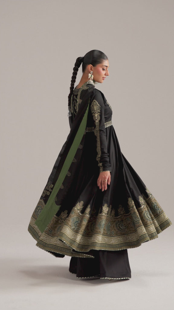 The Sunstone Set by Mannam is a Pima cotton anarkali featuring scalloped tilla and sequin embroidery, an embroidered koti jacket, wide-leg chatta patti trousers and a scalloped dupatta with intricate pallu work.