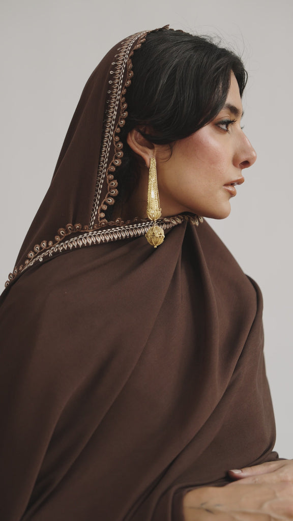 Model styling the ready-to-wear Cocoa Set deep brown heavy khaddar ensemble, showcasing the relaxed fit profile for premium Pakistani winter clothing in the UK.