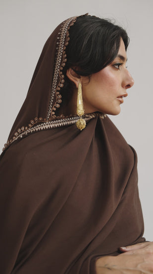 Model styling the ready-to-wear Cocoa Set deep brown heavy khaddar ensemble, showcasing the relaxed fit profile for premium Pakistani winter clothing in the UK.